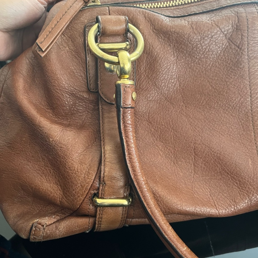 Coach Hampton Leather Carryall 15404
Brown Leather Handbag with Gold Accents - Picture 13 of 16